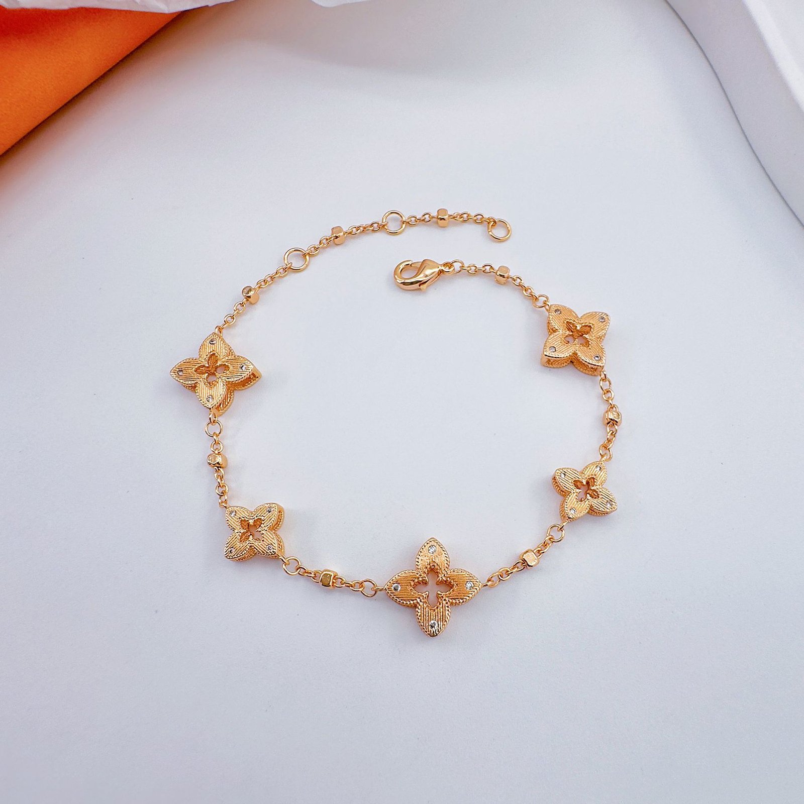 The Gold Lucky Charm Bracelet & Spiritual Healing — How Meaningful Jewelry Restores Balance and Attracts Good Fortune