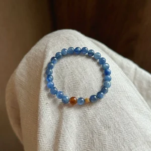 Home 5 Natural blue kyanite luck bracelet with a single gold accent for 2026 Feng Shui balance