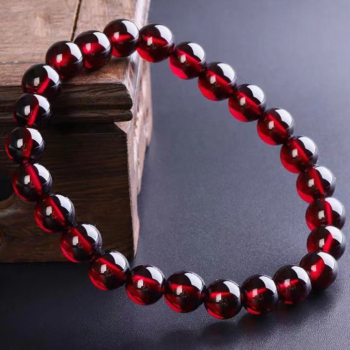 "The Wealth Alchemist" – Natural Red Garnet Prosperity Bracelet | March 2026 Fire-to-Wealth Talisman 4 Close-up of translucent red garnet beads showing deep luster and spiritual protection qualities